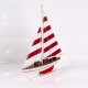Velero de navegación decorativo rojo